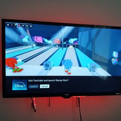 55 INCH BARELY USED ROKU TV 