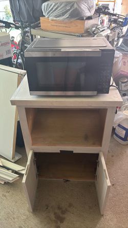 Microwave and cabinet