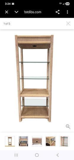 Vintage rattan henry link wicker lighted shelves etagere display with 5 shelves.

 Henry Link wicker wrapped etagere with glass shelves
