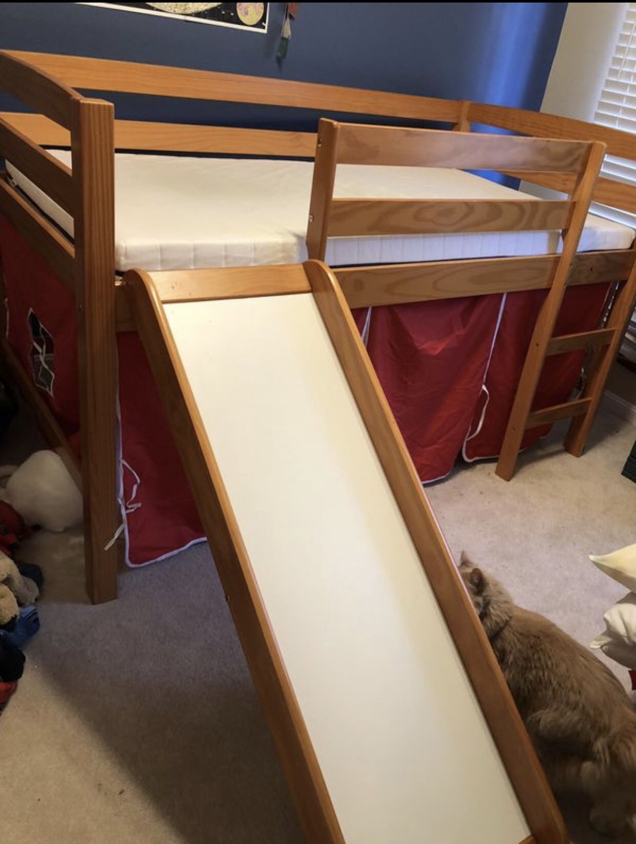 Twin size bed with slide