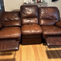 Leather power reclining sofa with USB $150 