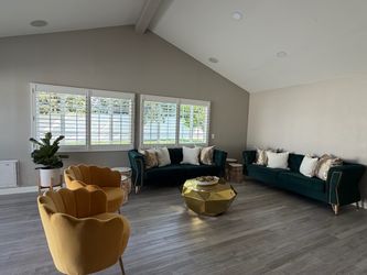 Emerald green velvet sofas with gold accents. I bough each for $1,000