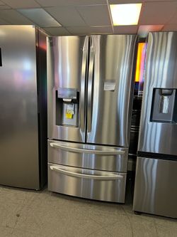 LG STAINLESS STEEL 4 DOOR FRIDGE