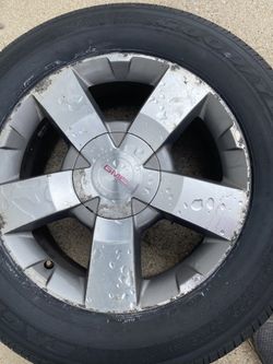 GMC Rims, Two With Tires And Two Without Tires