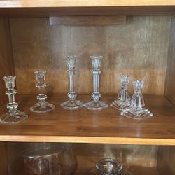 A Lot Of Three Pairs Of Vintage Crystal Candlesticks One From Tuscany One From Mi Casa. The Other Is Neiman Marcus.