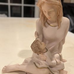Statue Of The Mother And The Child