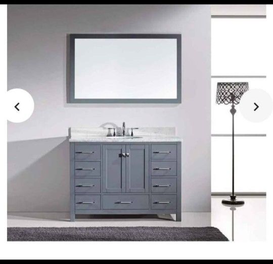 Caroline Avenue 45.7 in. W x 31.5 in. H Framed Mirror in Gray Finish.