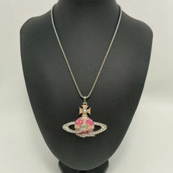 Brand new silver necklace with Saturn-shaped pendant