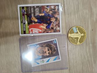 Messi collectible cards and coin