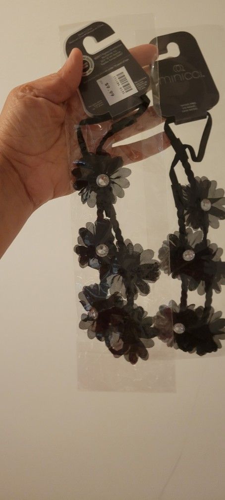 brand new 4 rhinestone headband .. 2 black and 2 brown .. all 4 $10