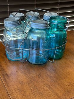 Vintage Mason jars and wire holder