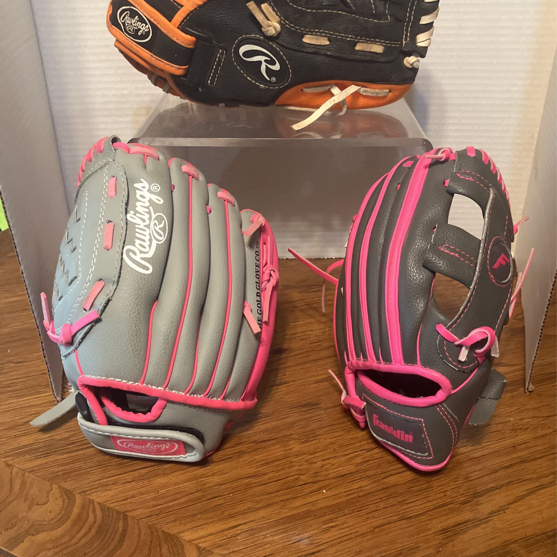 Two Baseball Gloves, 9.5”,  & 10”(BLACK GLOVE SOLD)