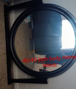 40-inch round black mirror.