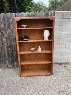 Mid-century, modern style or vintage wood note chip board, bookshelf, adjustable shelves
