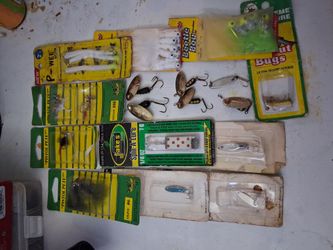 Assorted fishing lures spinners and pistol petes
