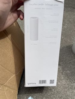 Two Medium Sized White Candles