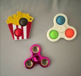 Lot of 3 Fidget Toys: Pink Metal Hand Spinner, Pop It Popper, White 3-Button