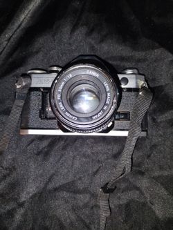 Brand New Camera It's A Brand New Canon AE Equal One It Is My Grandfather' Passing Away I'm Just Trying To Take Care Of Me And My Daughter