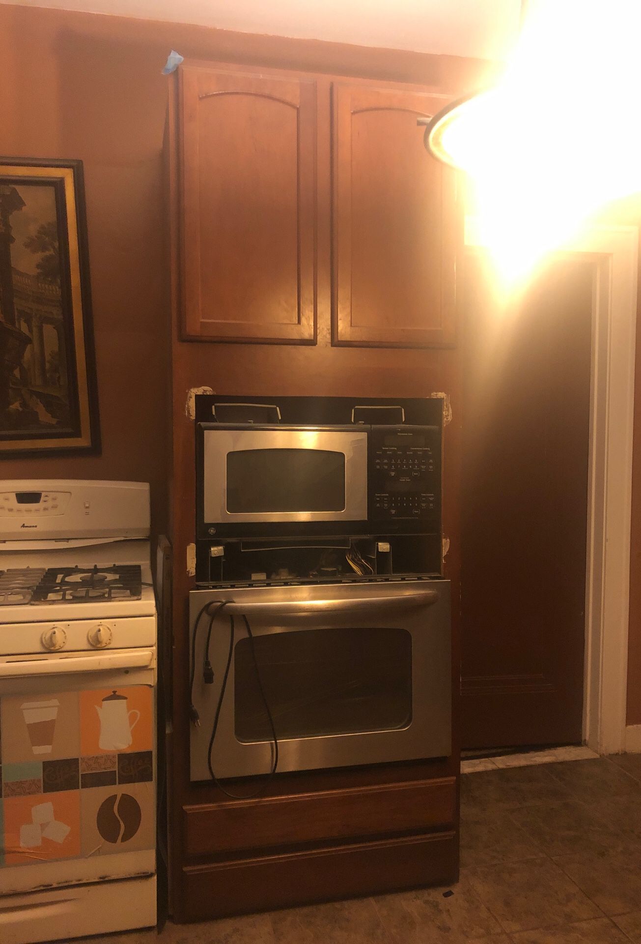 Kitchen cabinet and chandelier for sale