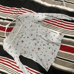 light blue long sleeve with floral design 