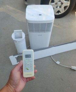 Like new portable ac with hose/ window kit amd remote / works great/ blows ice cold air fast