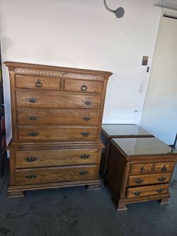 Two night stand with tempered class top and a dresser
