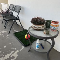 Two Outdoor Chairs and Glass Side Table