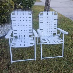 2.  WHITE PATIO AND OR BEACH FOLDING CHAIRS 
