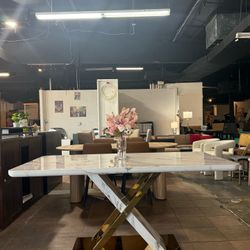 63-inch modern dining table features a white faux marble tabletop and reinforced X-shaped metal legs, making it ideal for both kitchen and dining room