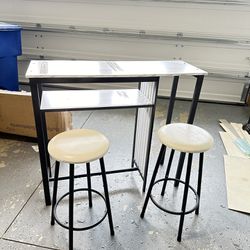 Bar Stools And A Table 