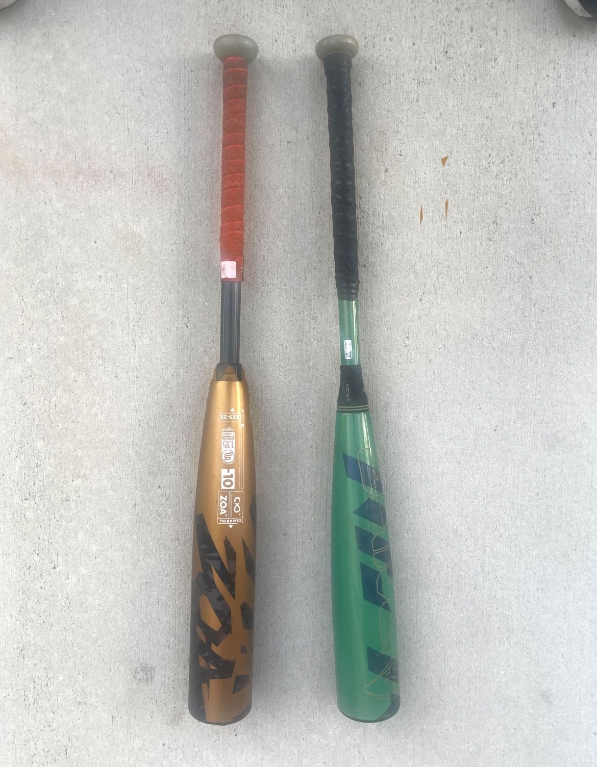 Demarini ZOA  Size 28 -10  And  Louisville META SIZE 28
