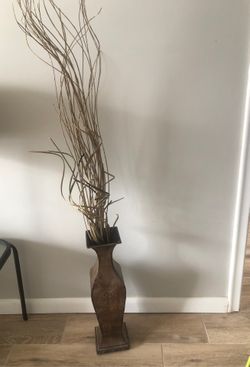 Metal vase with flowers