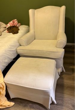 Cream nursery glider chair and gliding ottoman