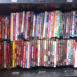 Full Husky Tub Full Of DVDS And Bluerays - Completely Full Two Rows Stacked On Each Other))