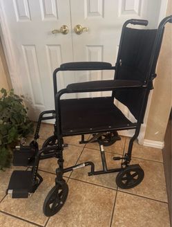 Medical transport chair. Folds quick , easily  & compact.