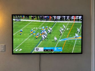 Samsung 60-inch Smart TV w/ remote & wall mount