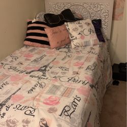 Brand New Bed With Mattress That Has Covering.