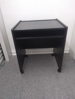 Black table on Wheels