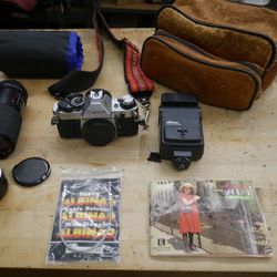 Black Canon AE-1 Program SLR Camera+50mm Lens 1:1.8 w extras Albinar ADG 80-200mm 1:3.9 lens; Albinar Thyristor 90 MDT flash; case; manual. Rare