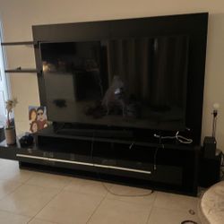 pick up today!  black tv stand with storage and shelves