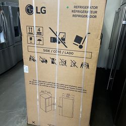 New In Box Lg Four Door Refrigerator In Stainless Steel