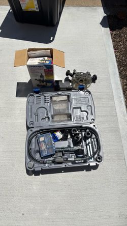 Dremel Plunge Router Attachment and assorted bits
