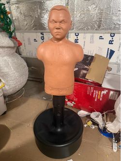 Kids punching dummy