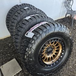17" KMC rims w- 35" American RoadStartires