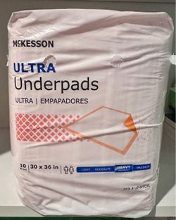 ultra underpads heavy absorbency 10 per pack new (pink colored plastic backing)