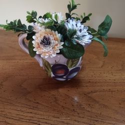 Handmade shells in creamer cup