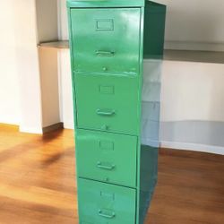 Green metal tall 4 -drawer standard / letter file cabinet 