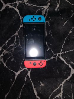 Nintendo Switch with broken back stand ands broken right switch