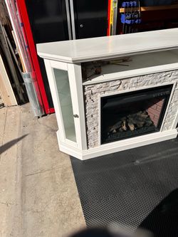 Corner TV stand with electric fireplace