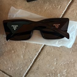 Prada Women Glasses